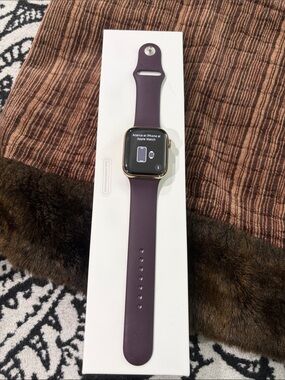 Apple Watch Gold Case with Plum Sport Band